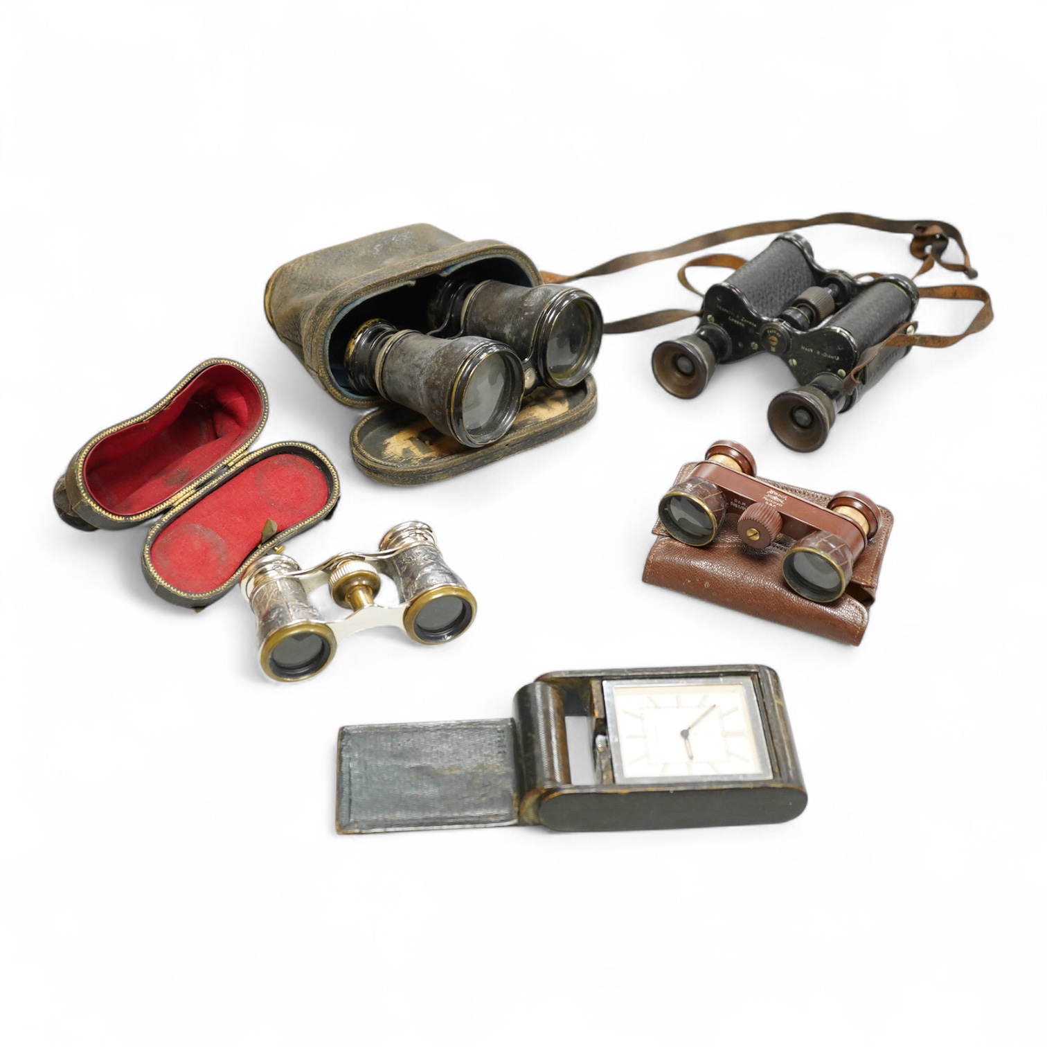 A Le Coultre desk timepiece, and four pairs of opera glasses